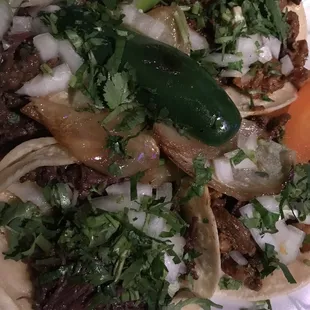 Cabeza, tripas, y adobada tacos