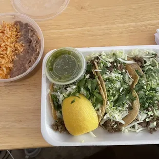 3 asada tacos, rice and beans