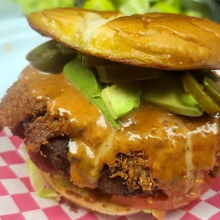 deep fried bacon chipotle avocado burger