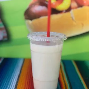 a hot dog with ketchup and mustard