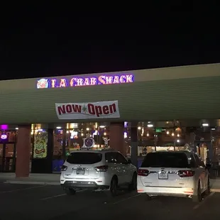 the front of the restaurant at night