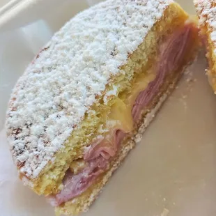 Closeup of the melted cheese in Las de Cayey mallorca sandwich