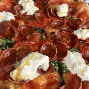 Hot burrata pizza with pepperoni added