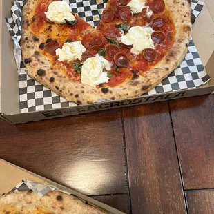 two pizzas in a box