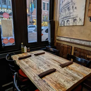 a wooden table and chairs