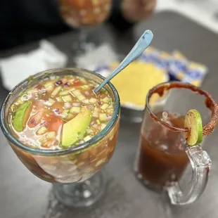 a close up of a drink and a plate of food
