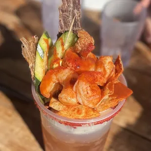 Michelada con carne seca and all the toppings