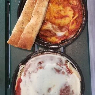 Beef Ravioli (top), Eggplant Parmesan (bottom), breadsticks