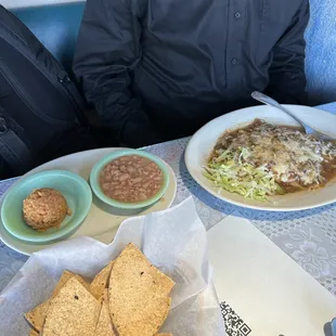 Cheese &amp; onion enchiladas with green sauce are vegetarian