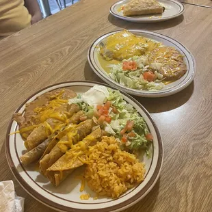 Taquitos and tamales platter with a side of crispy beef taco