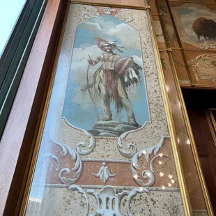 a painting of a man riding a horse