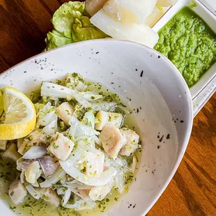 Peruvian Ceviche: Fish chunks marinated in lime juice and peruvian spices.