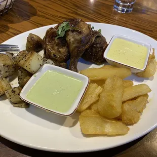 1/4 dark chicken, yuca, and potatoes.