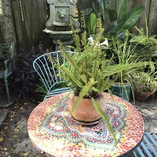 Colorful mosaic table in the garden