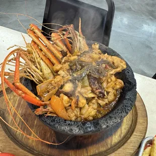 Seafood molcajete  7.5/10. Great flavor but the seafood definitely got overcooked after a few minutes.