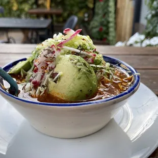 Pozole Rojo with chicken and avocado. The bowl is bigger than it looks.