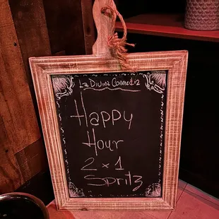 a happy hour sign