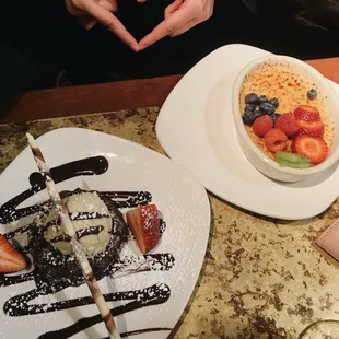 two plates of desserts on a table