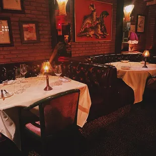 a dining room with tables and chairs
