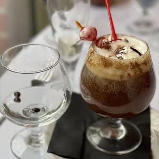 a close up of a drink on a plate