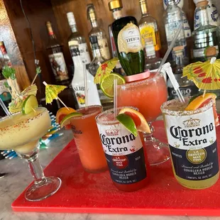 a variety of drinks on a bar