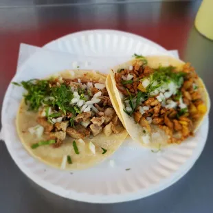 Steak Taco and Al Pastor Taco