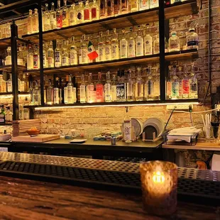 a bar with bottles of liquor