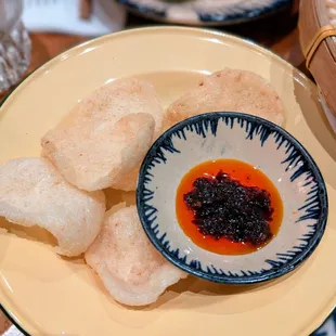 Complimentary homemade prawn chips and fish sauce