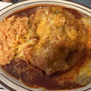 Carne adovada Stuffed sopapilla with red chile.