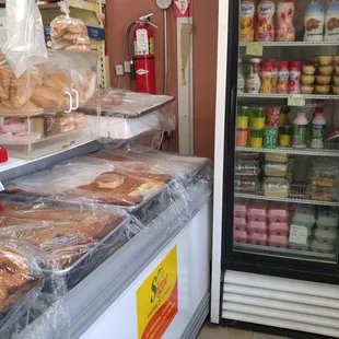 Cooler with cakes, flan etc and more freshly baked desserts.