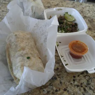 Burrito next to taco