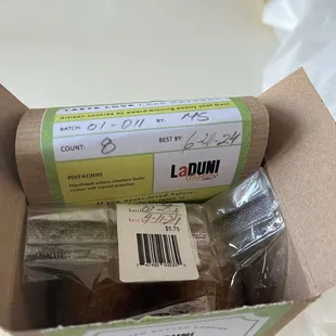 Outside has the erased and overwritten "new" expectation. The bag inside has the original expectation of April