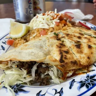 Asada quesadilla plate with beans and rice
