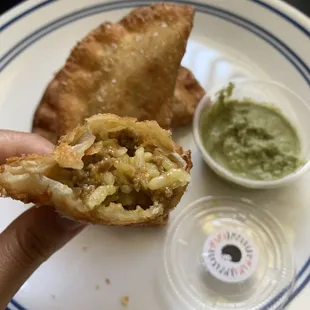 Beef empanadas with avocado crema