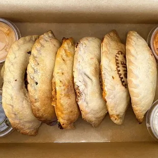 a variety of pastries in a box