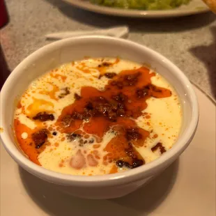 a bowl of soup on a plate