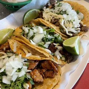 Steak, chorizo and pastor tacos with cilantro, onions, and cheese!!