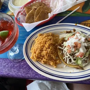Pastor Tostada, side of arroz, strawberry margarita, chips and queso