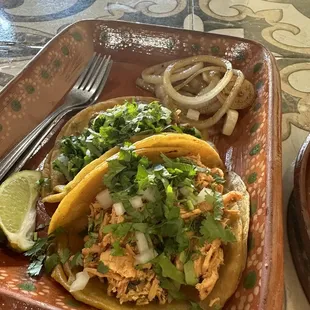 Chicken taco and steak taco on corn tortillas