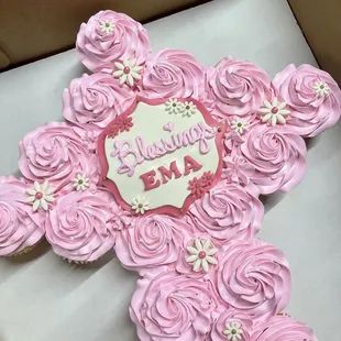 a pink rose cross cake