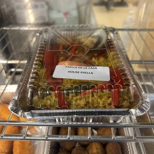 Convenient, grab and go. We bought the paella with black squid ink. Umami bomb and rich.