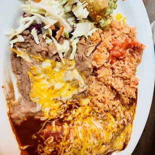Taco and enchilada como plate