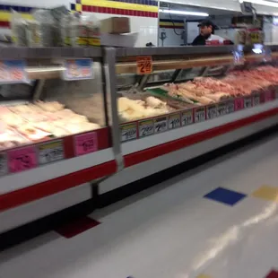 a meat section in a grocery store