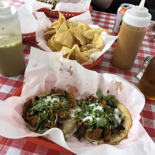 Tacos al pastor and chips