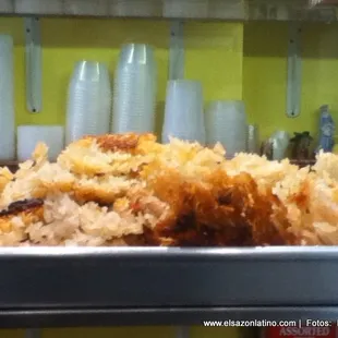 a plate of rice and meat