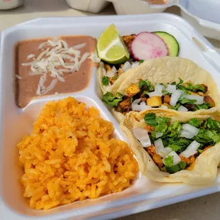 mexican food in a styrofoam container