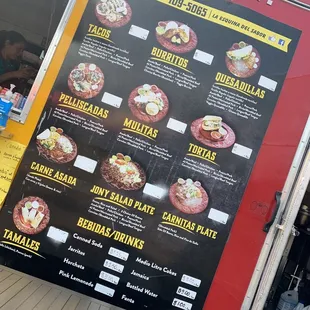 a menu on a food truck