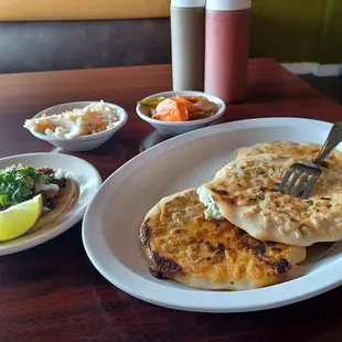 Three pupusas and a taco.