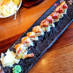 a sushi platter on a wooden table