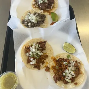 three tacos on a tray